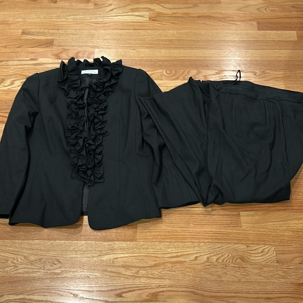 Tahari suit. Charcoal Colir. Ruffle detail on blazer.  Size 16